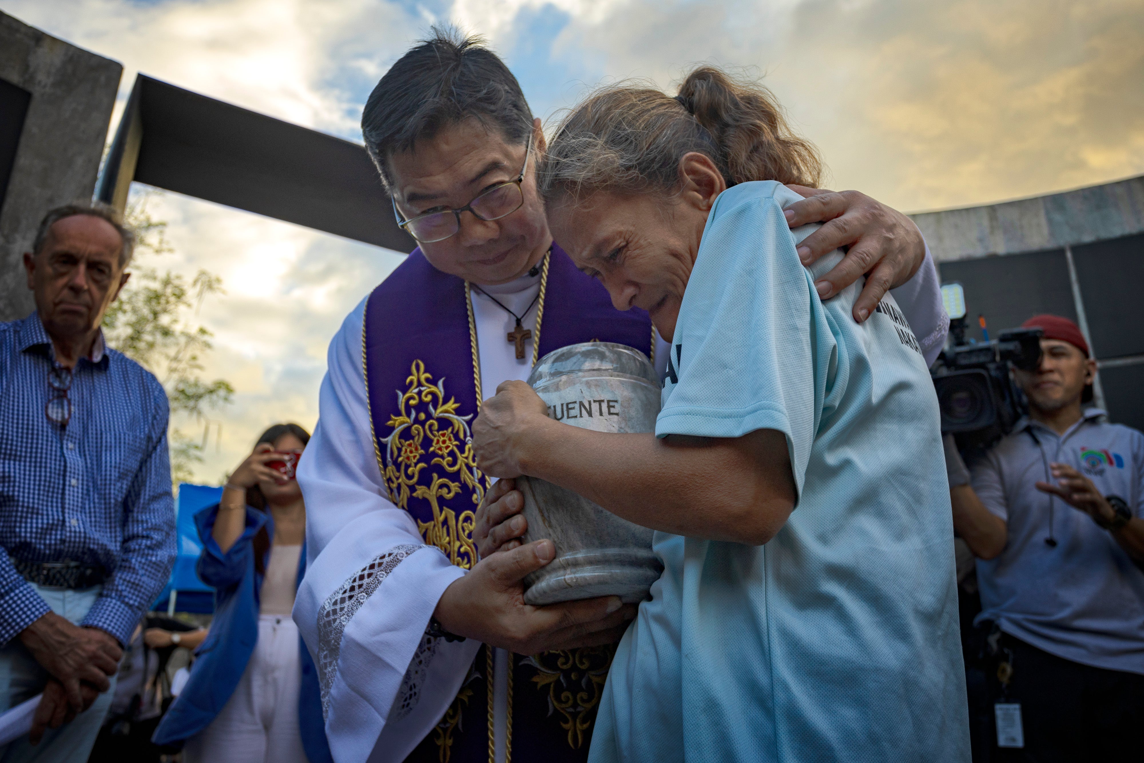 A relative of a victim of the drug war during a funeral ceremony at the Dambana ng Paghilom in Caloocan, Metro Manila, on 12 March 2025