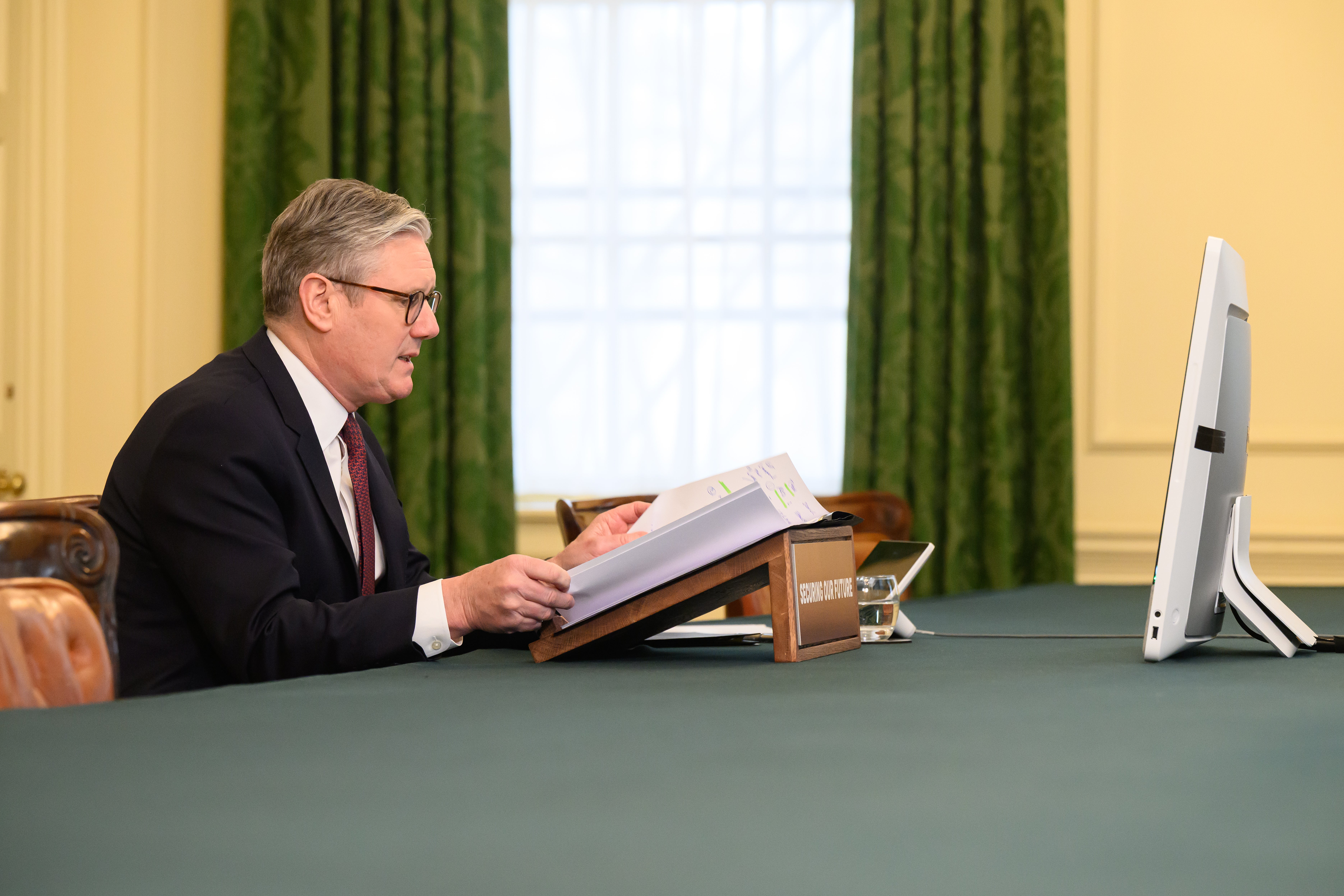 Sir Keir Starmer hosts the video conference call with world leaders (Leon Neal/PA)