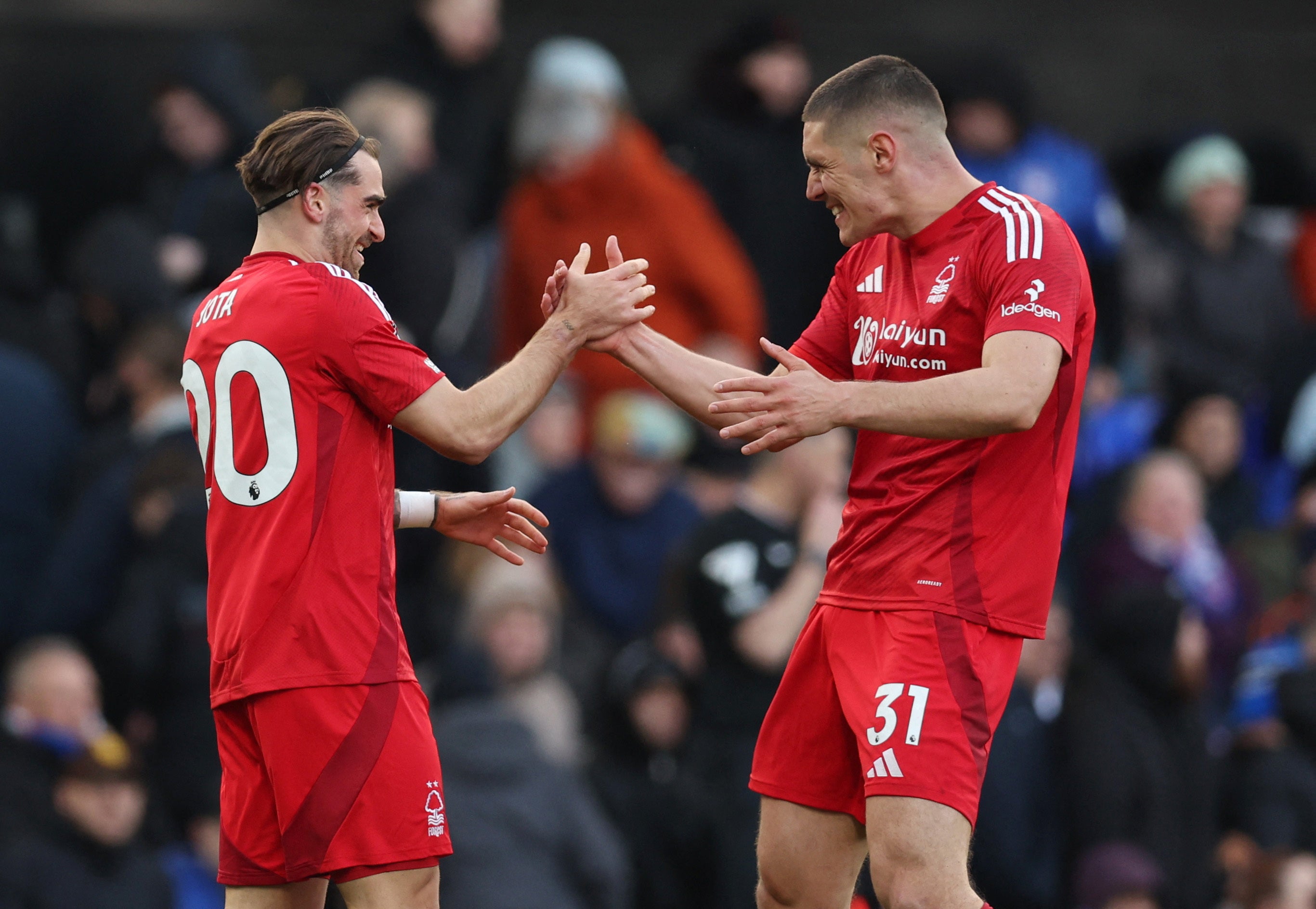 Nottingham Forest's Jota Silva celebrates scoring their fourth goal with Nikola Milenkovic