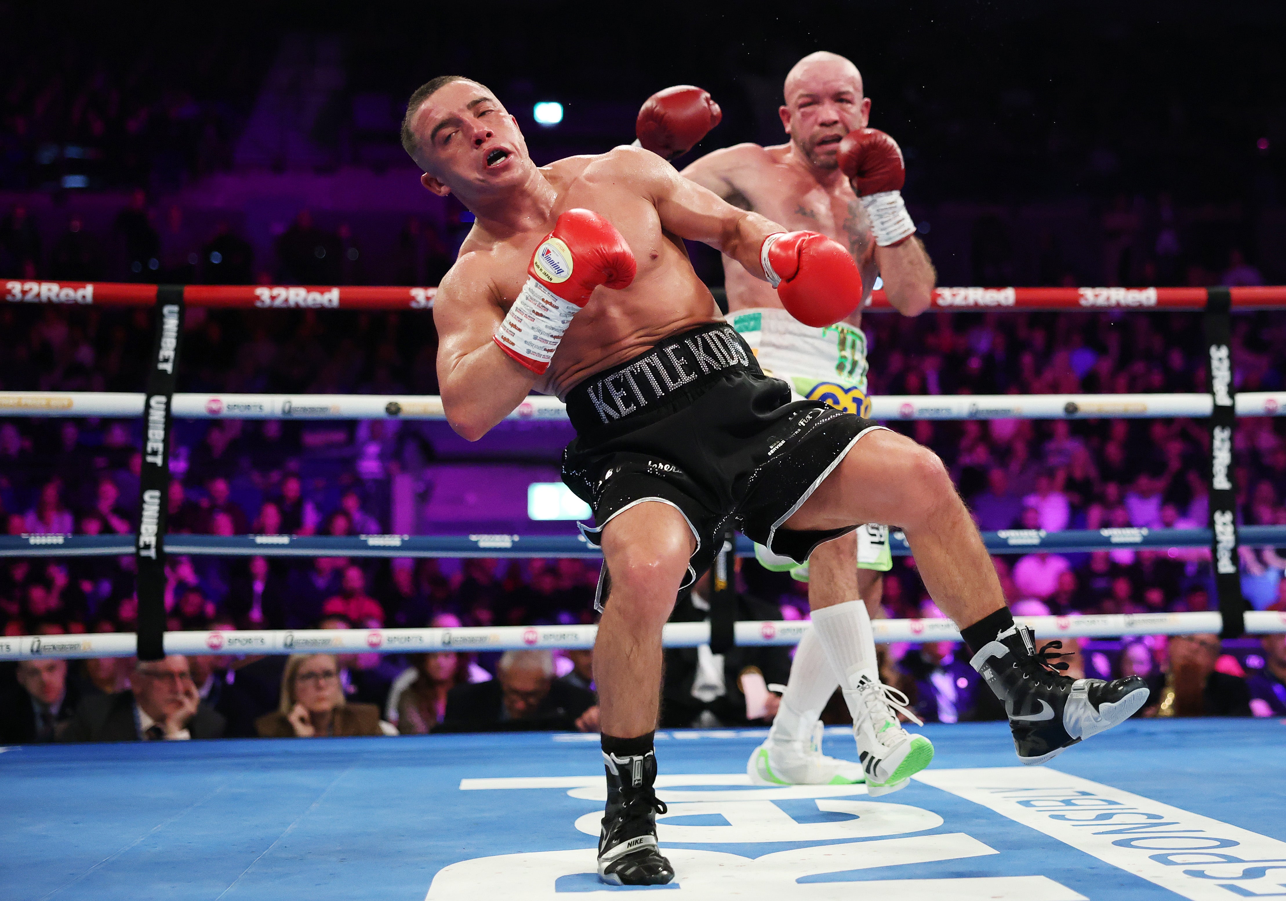 Nick Ball stumbles during the WBA World Featherweight title fight against TJ Doheny