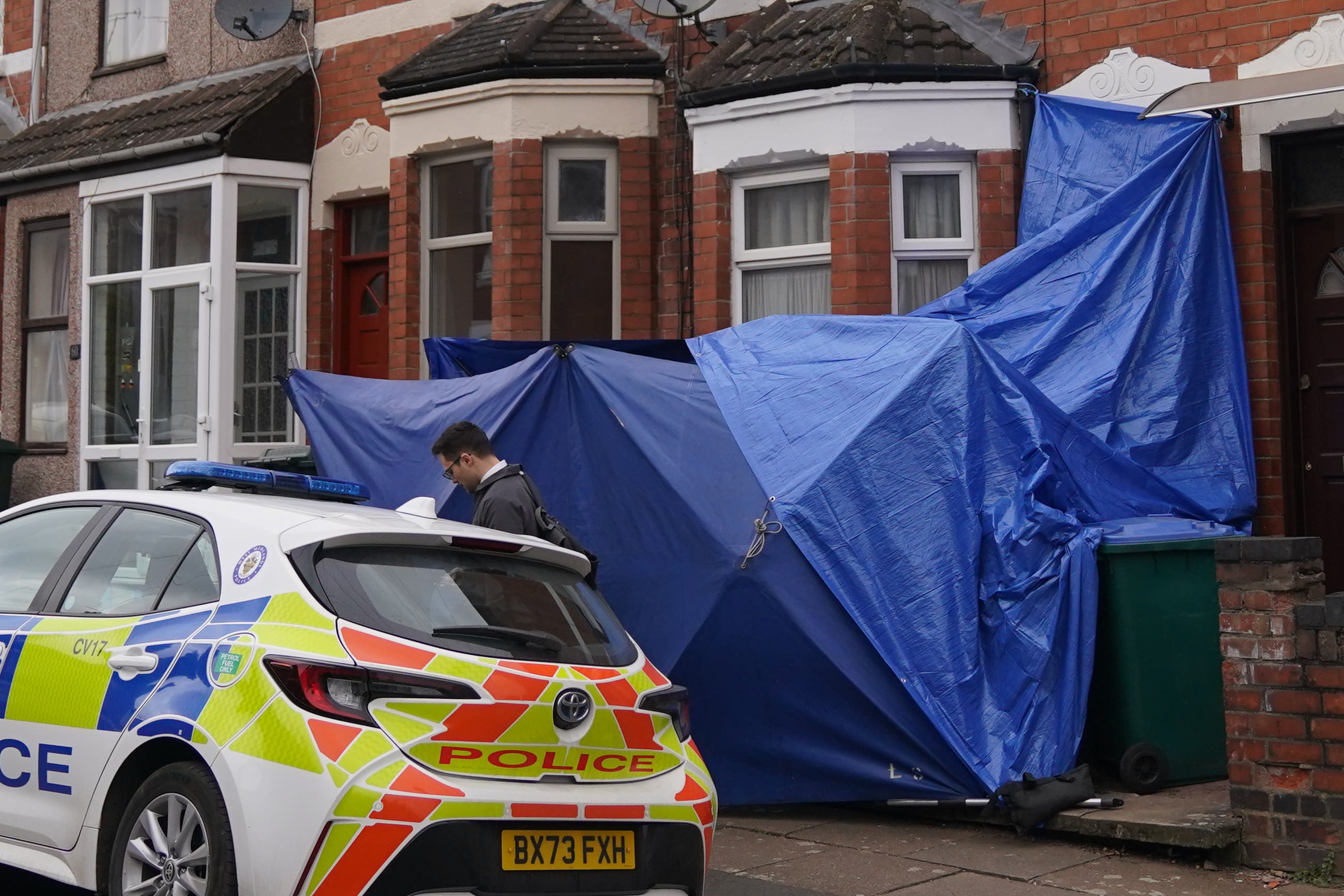 A police car at the scene on Newcombe Road in Coventry (Jacob King/PA)