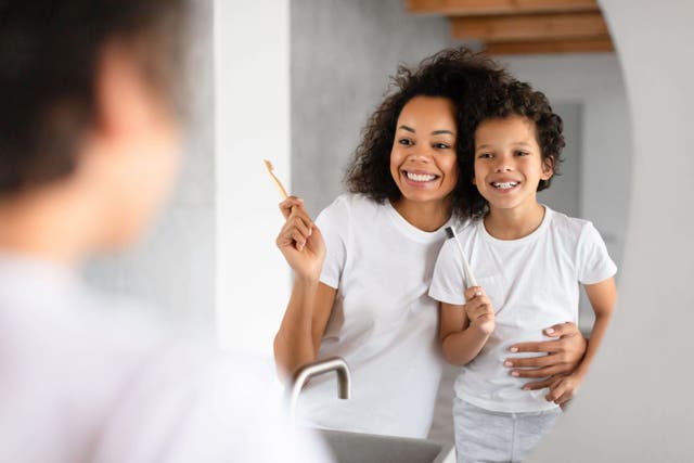 Here are some simple ways to get your kids to love brushing their teeth (Alamy/PA)