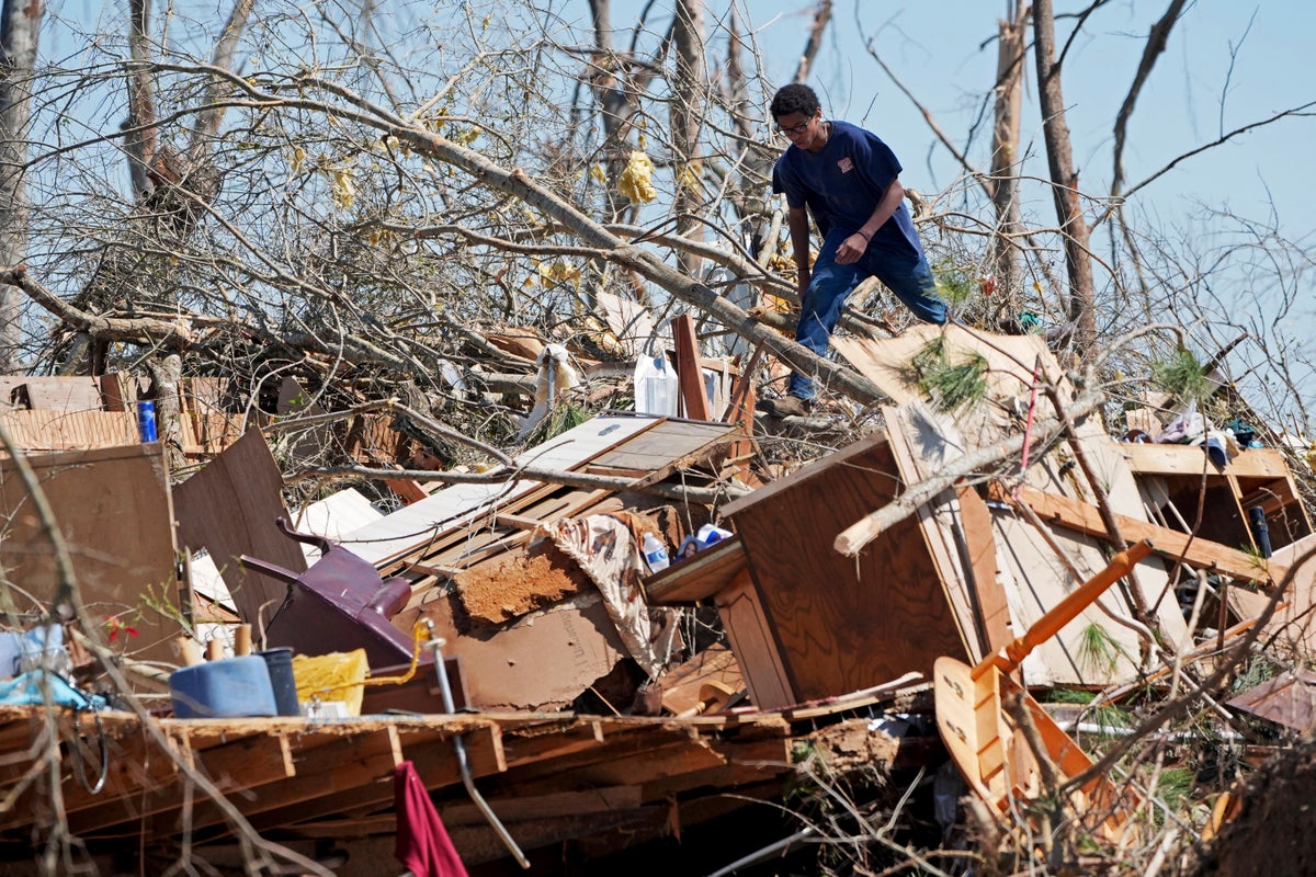 Death toll from weekend storms rises again after 140mph tornadoes and wildfires - and there is more bad weather on the way 