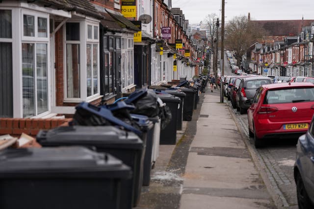 <p>Rows of overflowing bins in the Selly Oak area of Birmingham</p>