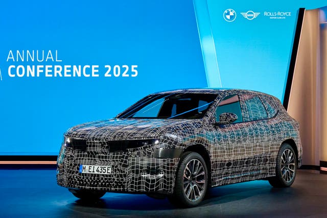 <p>The new BMW iX3 was shown in camouflage at BMW’s annual press conference</p>