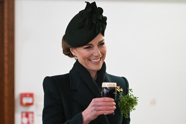 <p>The princess enjoys a glass of Guinness during the visit (Eddie Mulholland/Daily Telegraph/PA)</p>