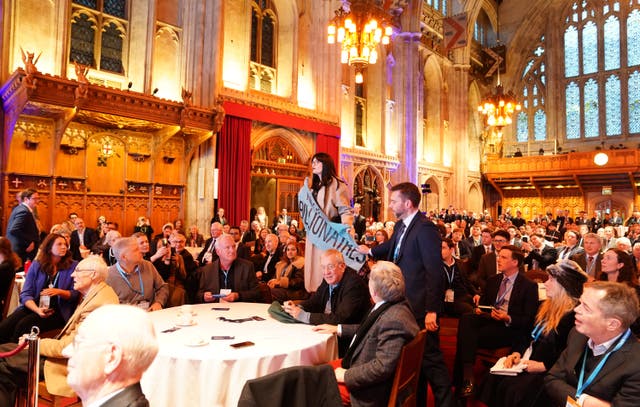 <p>Activists from Climate Resistance protest during Kemi Badenoch’s keynote speech (Ben Whitley/PA)</p>