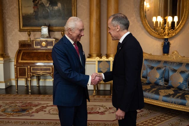 The King greets Mark Carney, the Prime Minister of Canada, at Buckingham Palace (Aaron Chown/PA)