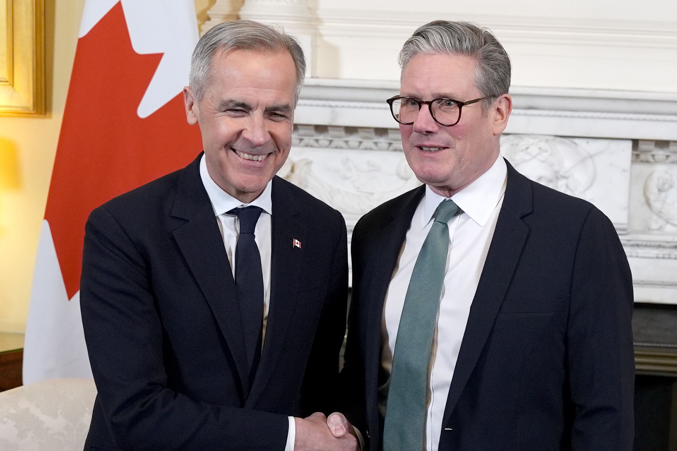 Mark Carney and Sir Keir Starmer (Jordan Pettitt/PA)