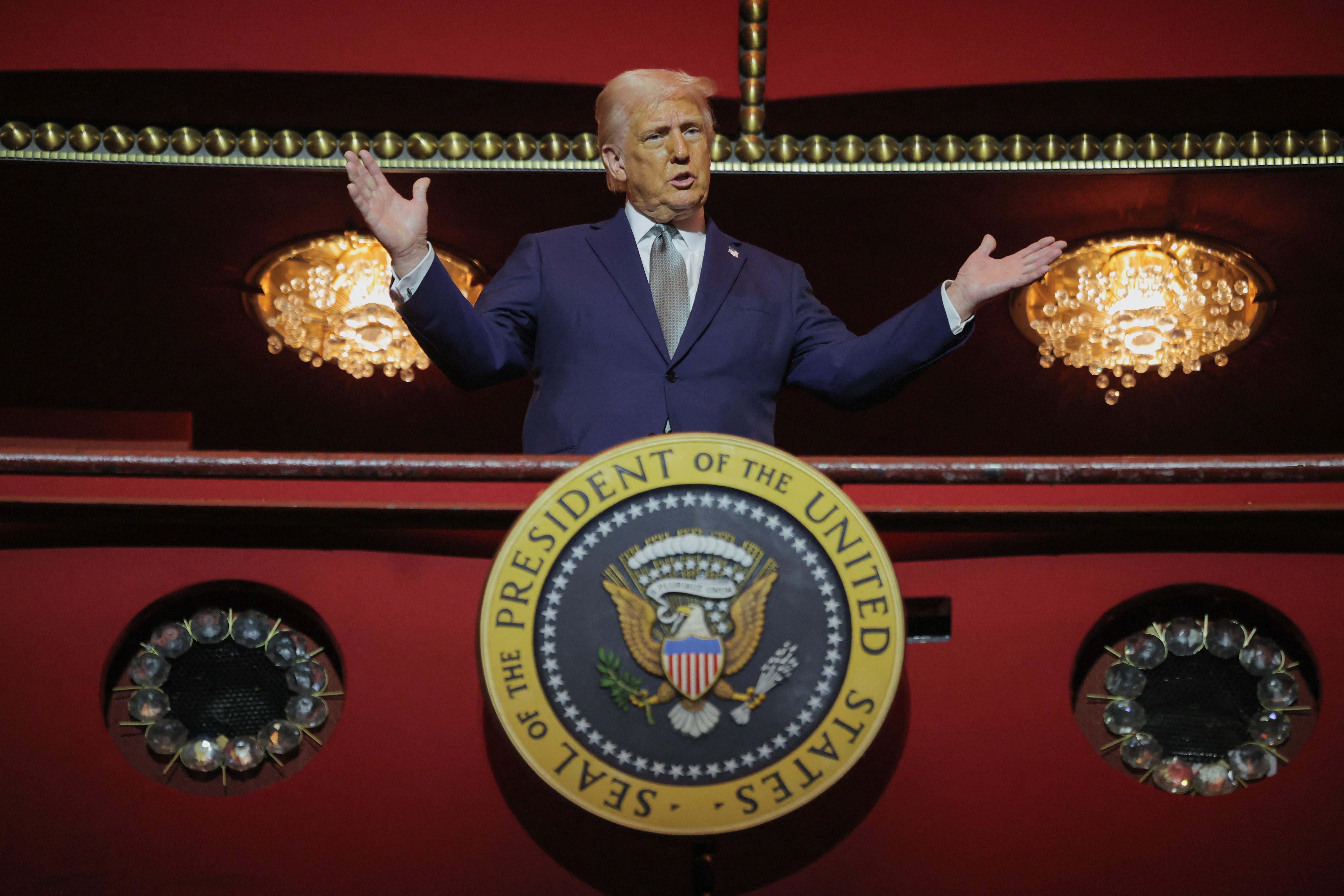 Donald Trump speaks to the press during a visit to the Kennedy Center of the Performing Arts Monday. Trump told the press that he planned to make public all of the government’s still unreleased documents related to the assassinations of John F Kennedy, Robert F Kennedy, and Martin Luther King Jr.