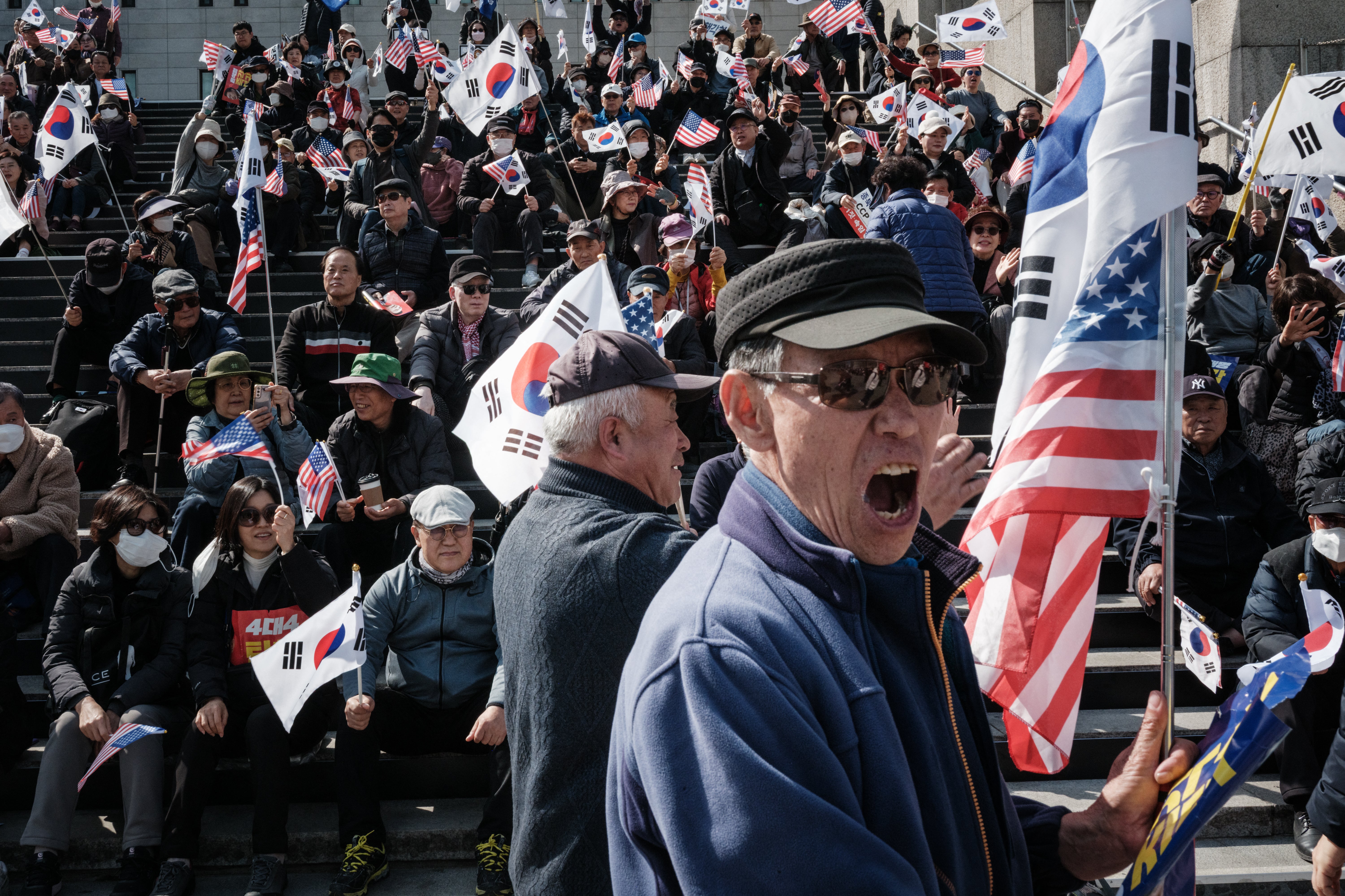 Supporters of impeached South Korean president Yoon Suk Yeol attend a rally in Seoul on 15 March 2025