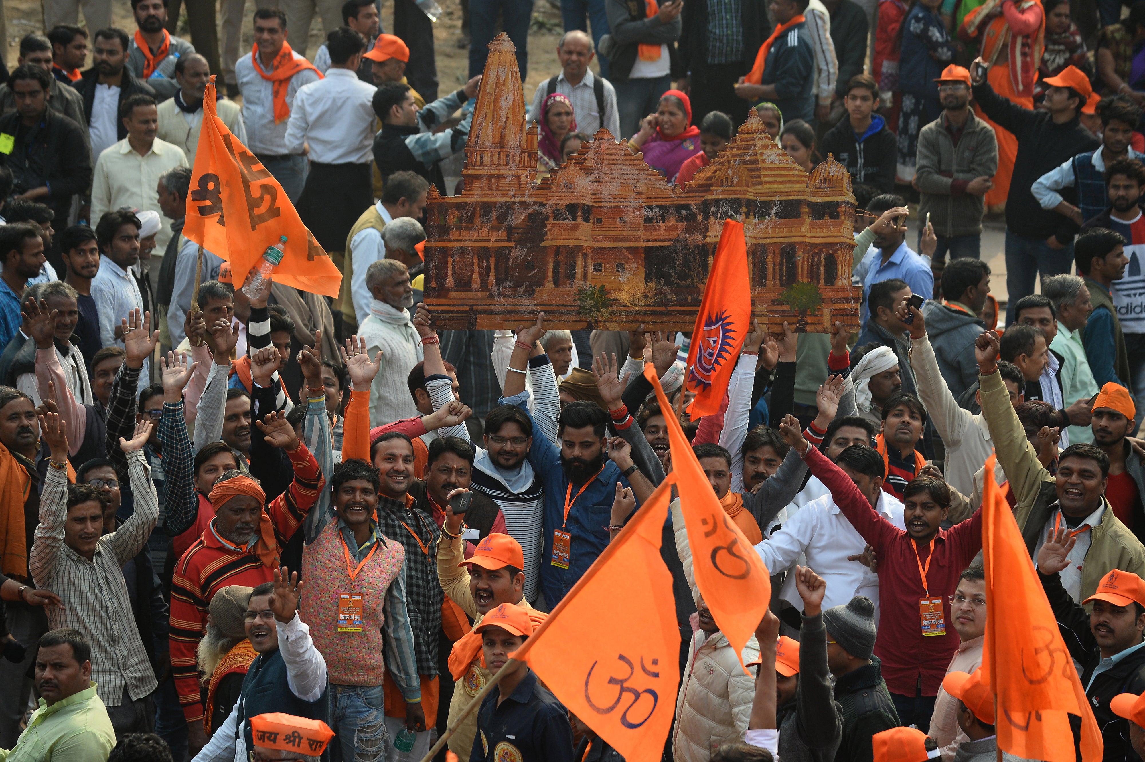 File. Indian Hindu hardliners hold a cut out of a temple as they participate in a rally calling for the construction of a temple on the site of the demolished 16th century Babri mosque, located in Ayodhya, in New Delhi on 9 December 2018