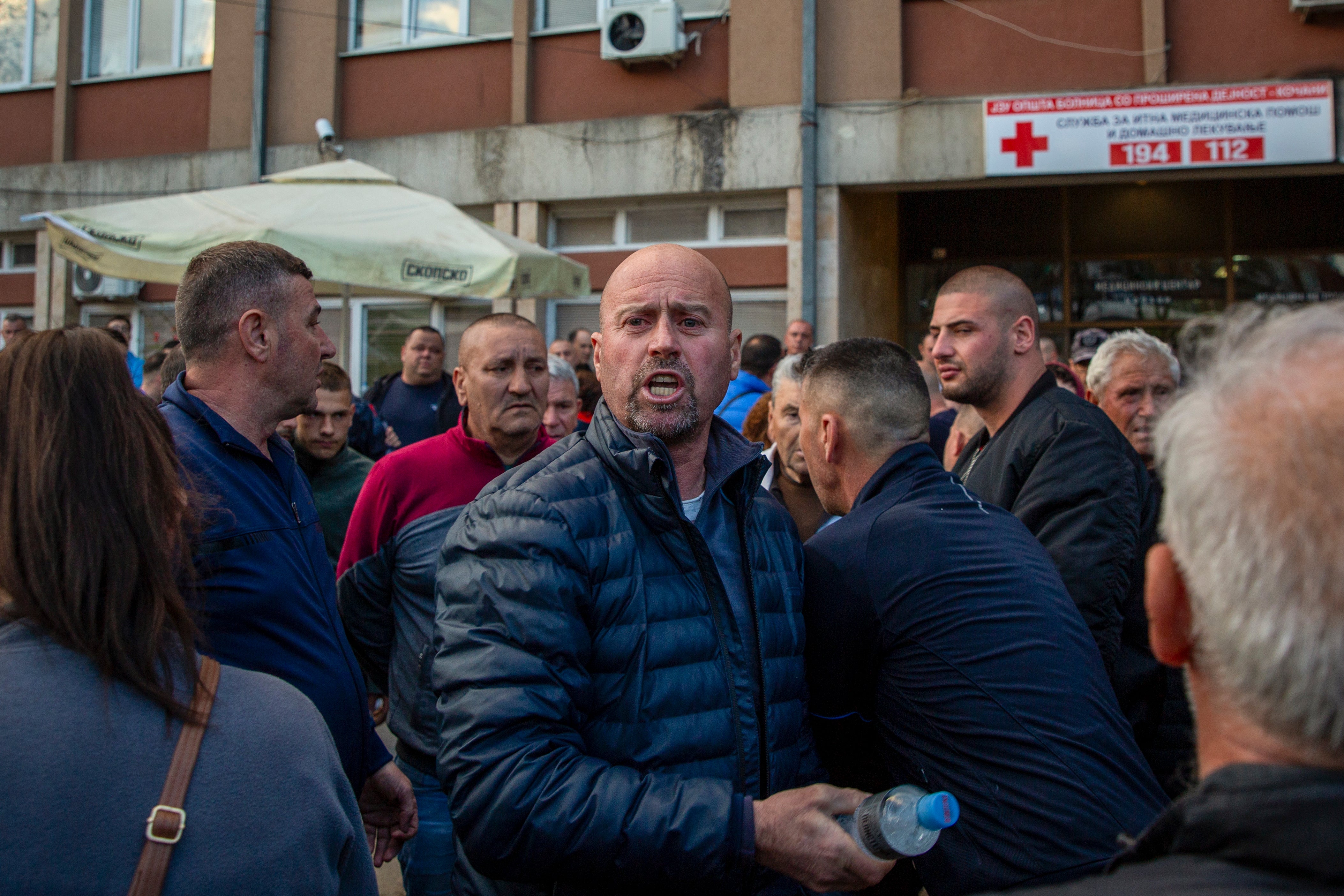 Parents of the victims, including fatherDragi Stojanov, gathered outside a Kocani hospital following the fire, demanding answers