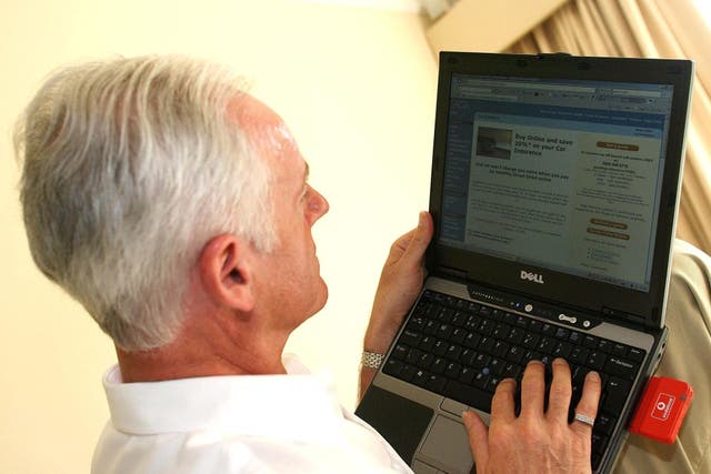 An Age UK report suggests a third of people aged over 60 say life is harder than it was five years ago because more services are online (Peter Byrne/PA)