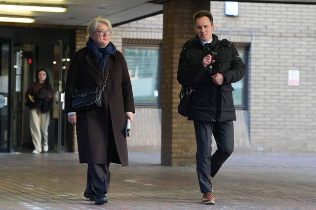 Ekaterina Ovsiannikova (left) and Alexei Owsjanikow leaving Southwark Crown Court, south London (Lucy North/PA)