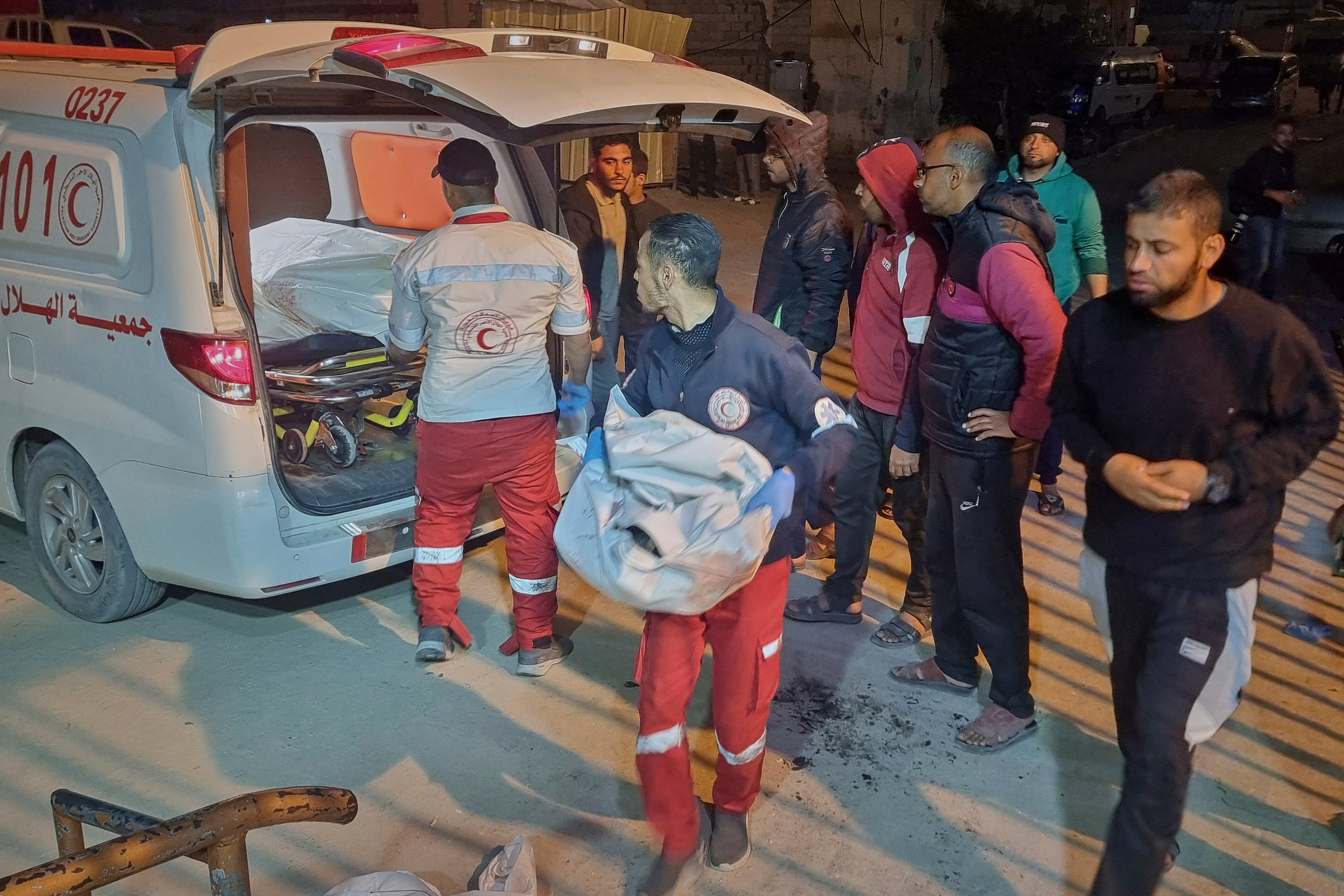 An ambulance carrying victims of an Israeli army strike arrives at the hospital in Khan Younis, southern Gaza Strip, Tuesday 18 March 2025