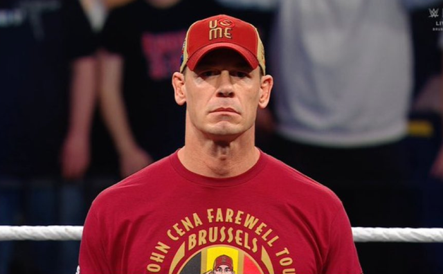 <p>John Cena addressing a WWE crowd in Belgium on an episode of Raw</p>