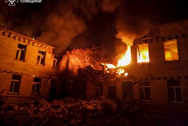Flames and smoke engulf a building after a Russian attack in Krasnopillia, Sumy region, Ukraine, overnight (Ukrainian Emergency Service via AP)