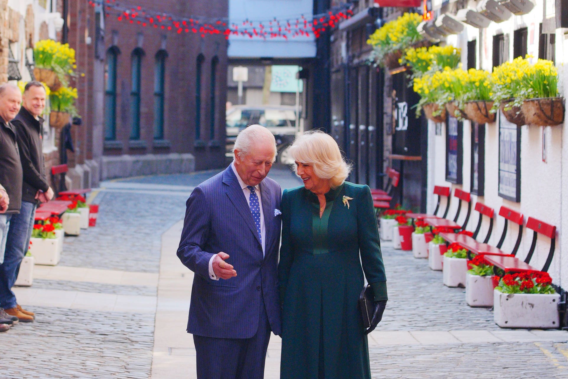 King Charles and Queen Camilla during their visit to Commercial Court, Belfast (Ben Birchall/PA)