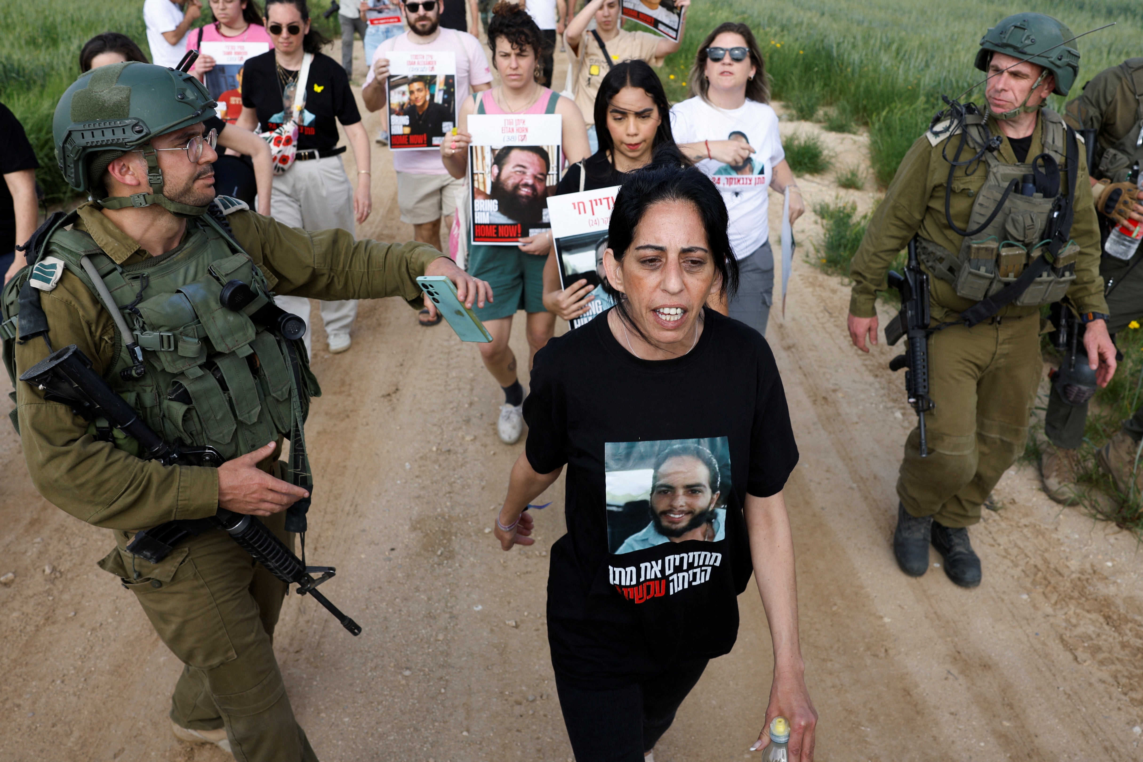 Einav Zangauker, mother of hostage Matan Zangauker, who was kidnapped during the deadly 7 October 2023 attack on Israel by Hamas, walks near Kibbutz Nir Oz, in the Israel-Gaza border