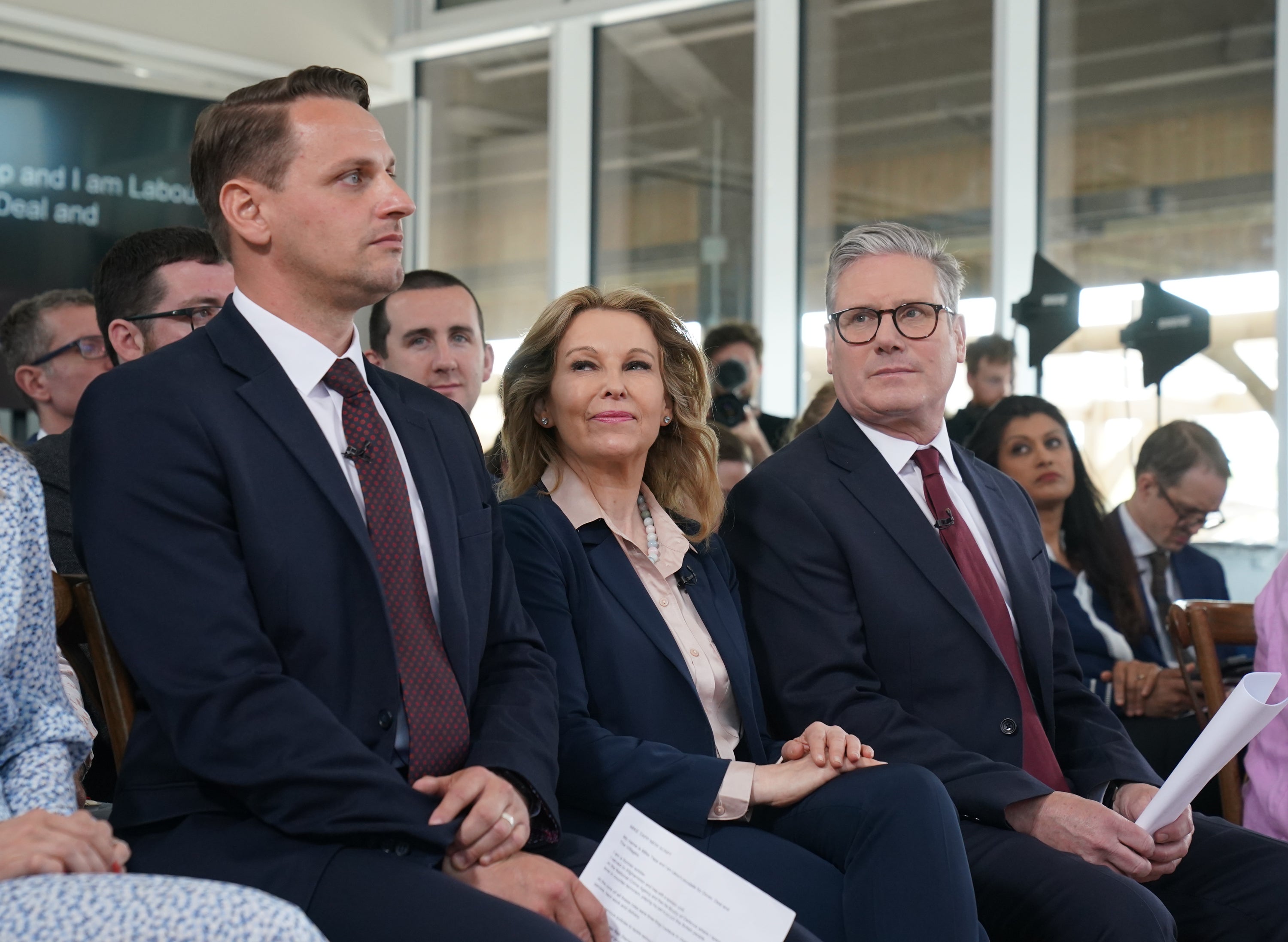 Mr Tapp sitting with Keir Starmer (PA)