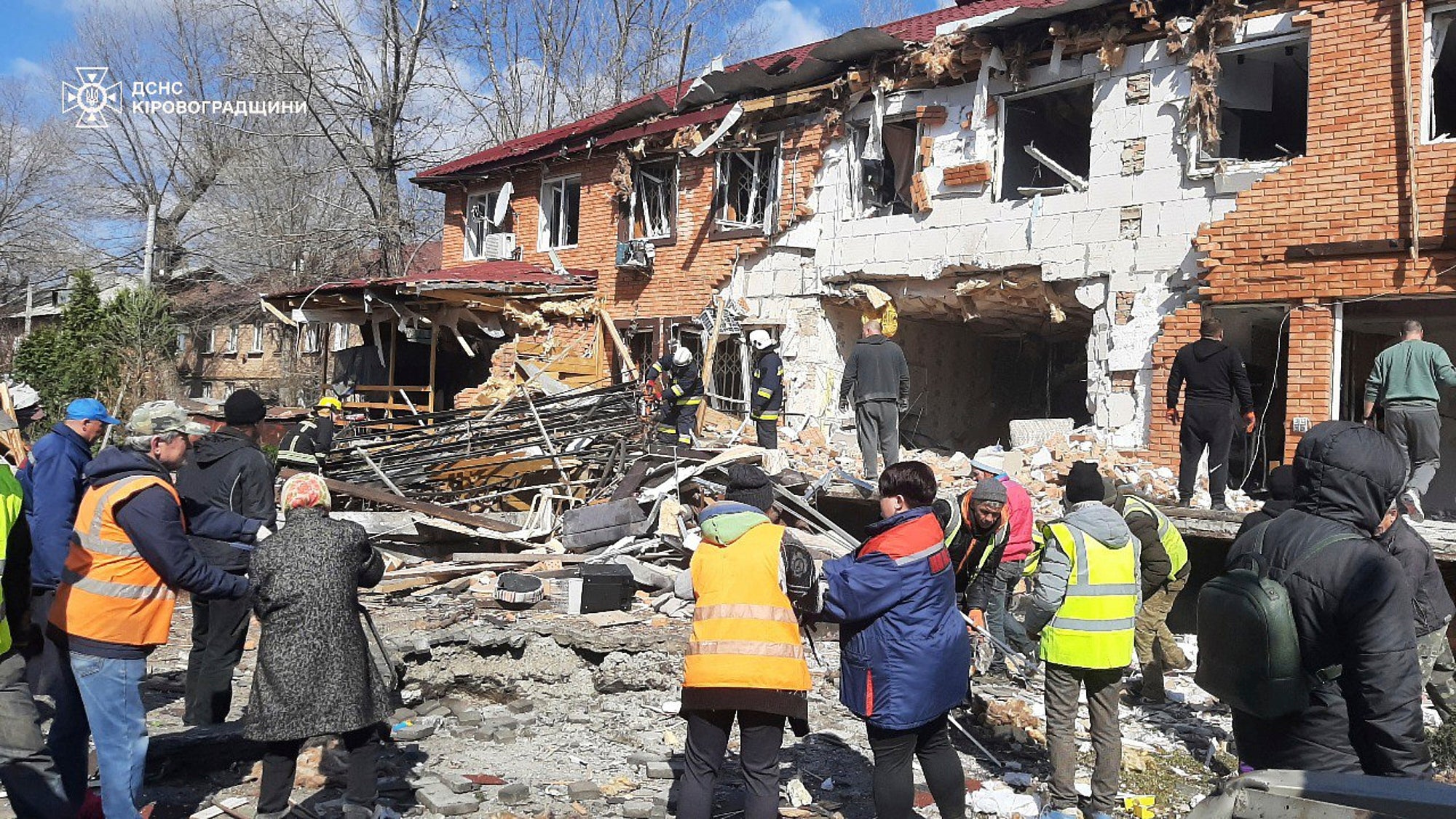 In this photo provided by the Ukrainian Emergency Service, residents clear the rubbles following a Russian drone attack in Kropyvnytskyi, Kirovohrad region, Ukraine on Thursday. (Ukrainian Emergency Service via AP)