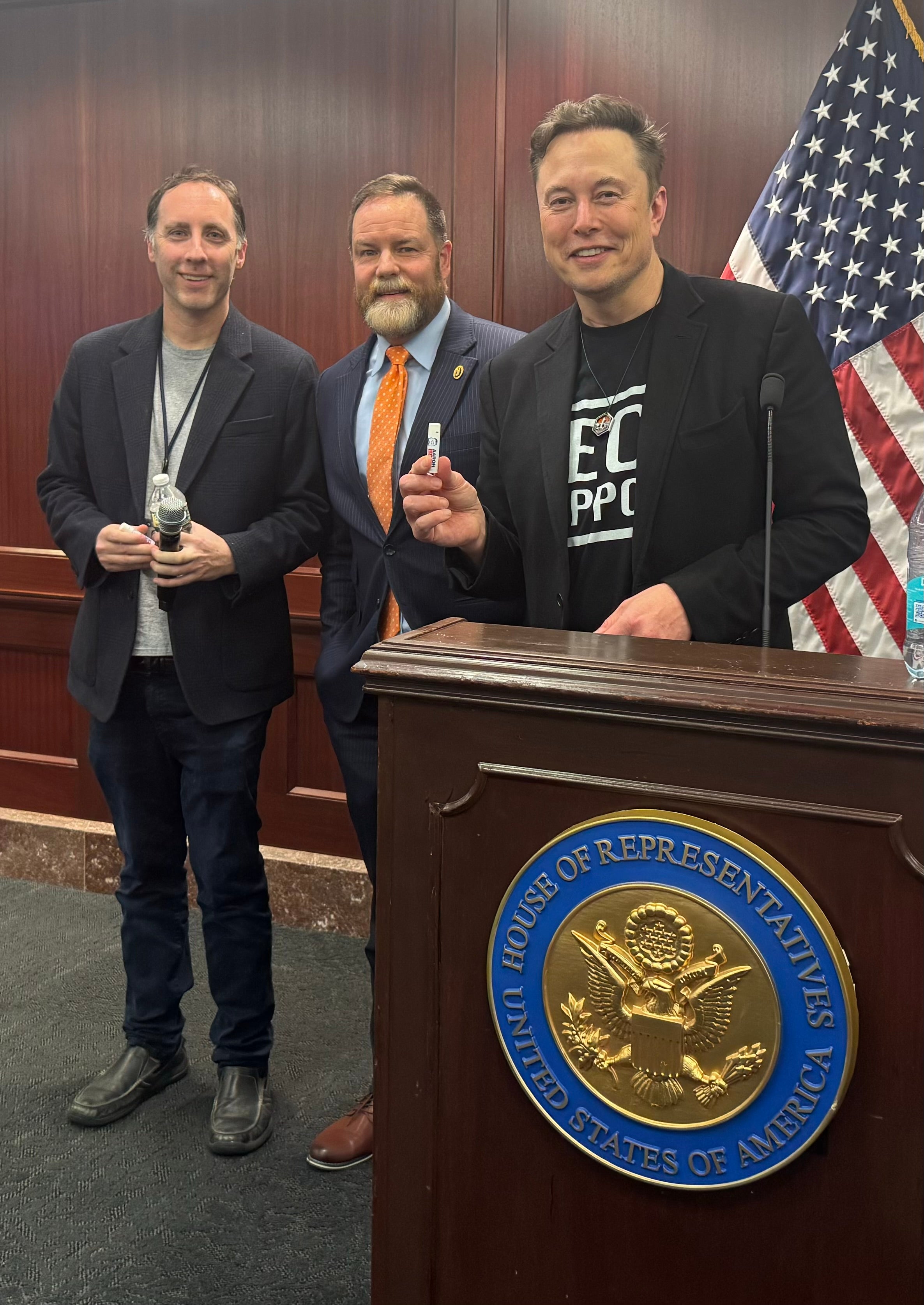 Steve Davis, left, poses for a picture alongside Rep. Aaron Bean and Elon Musk. Davis serves as the day-to-day leader of DOGE, according to a report