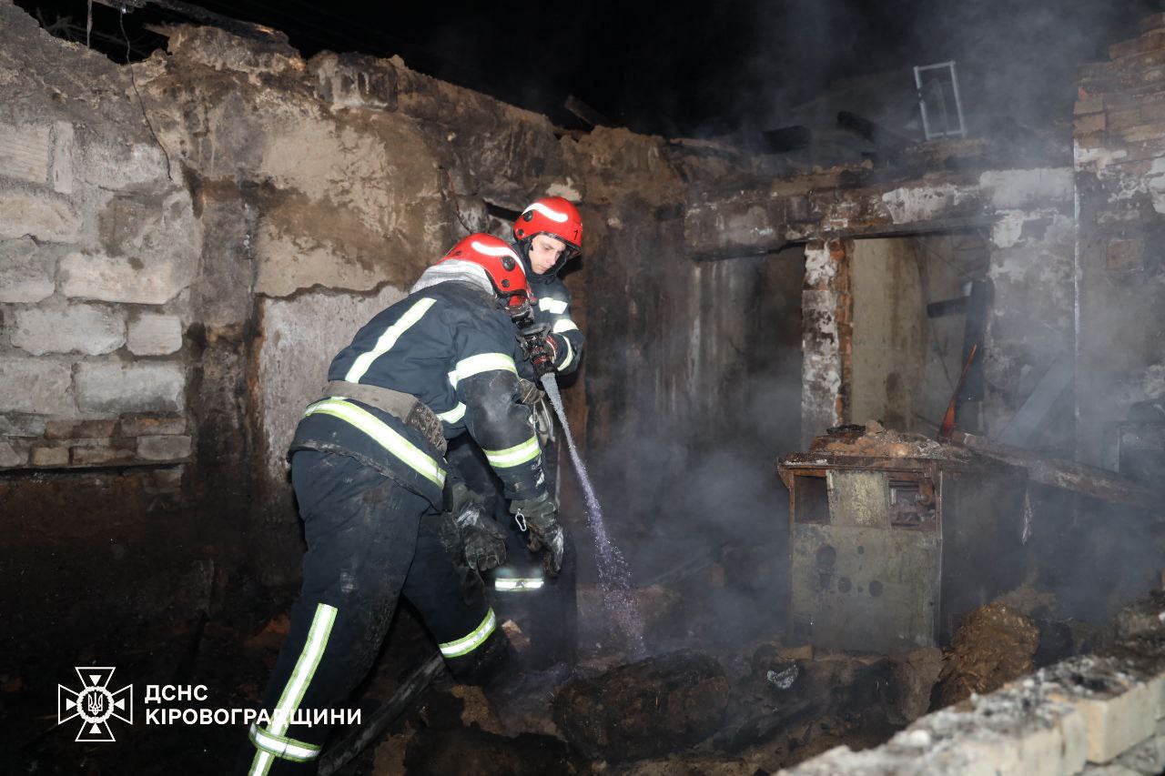 Rescuers working at a site of a strike in central Ukraine