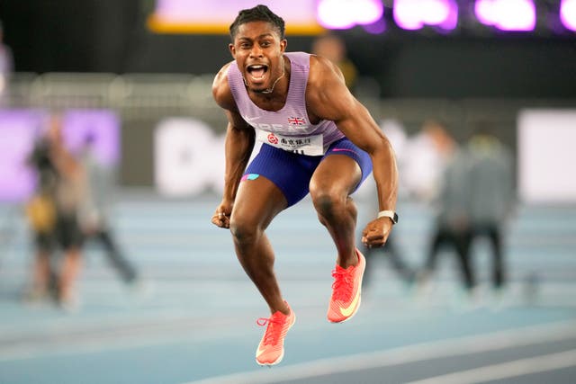 <p>Jeremiah Azu celebrates after clinching gold in the men's 60m final</p>