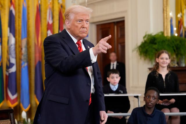 <p>President Donald Trump gestures after signing an executive order in the East Room of the White House</p>