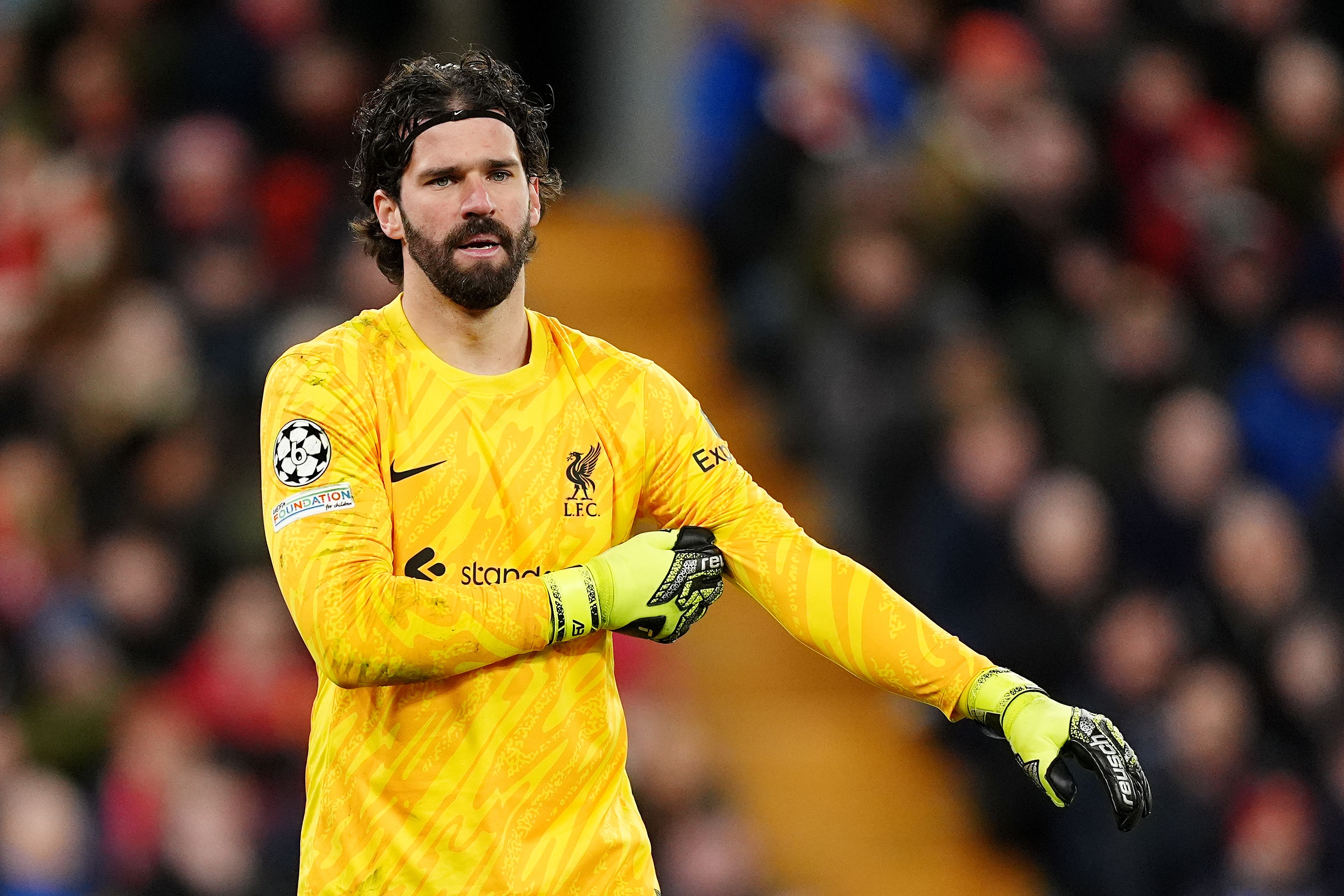 Alisson Becker has returned to Liverpool after sustaining a head injury on international duty with Brazil (Martin Rickett/PA)