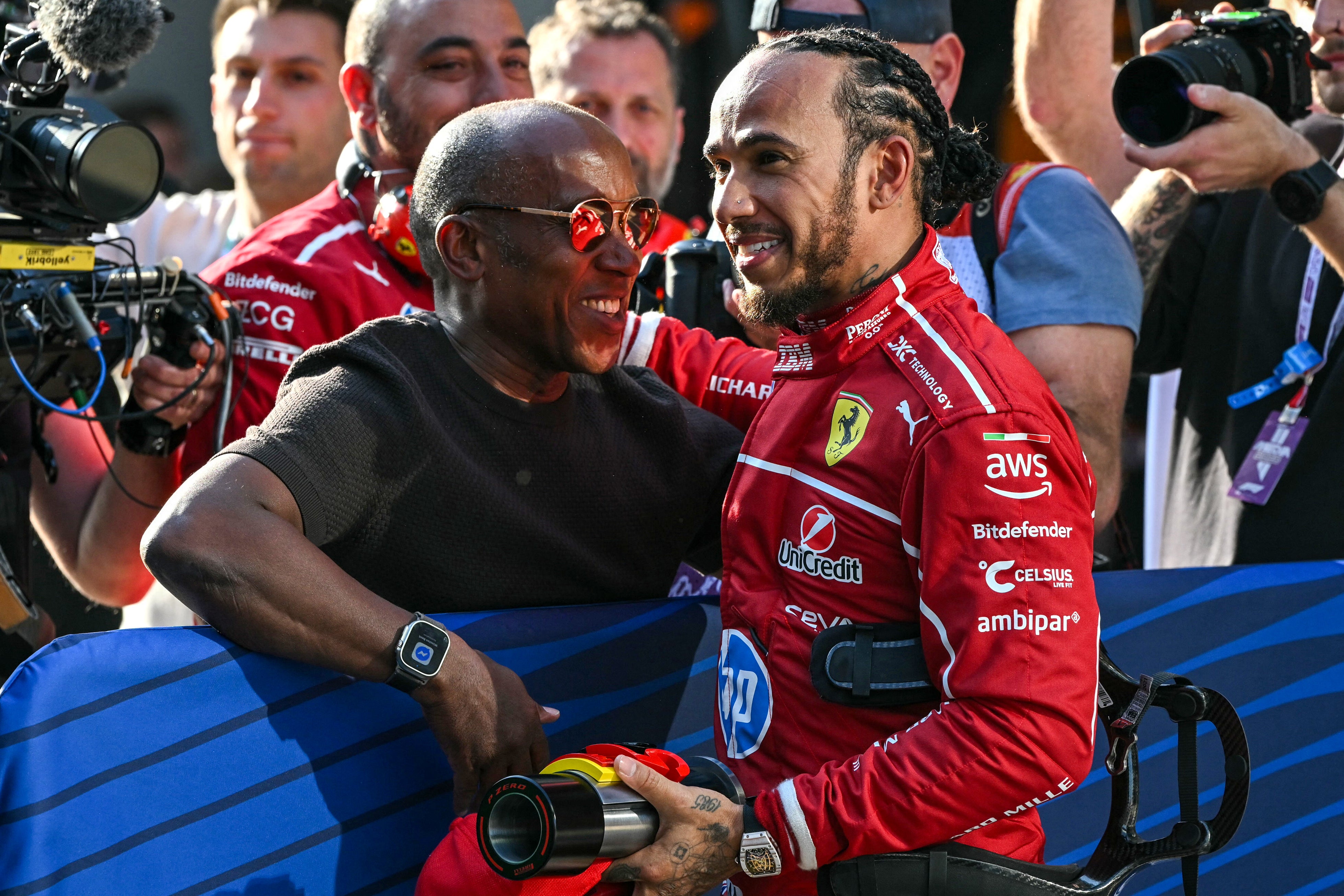 Hamilton (pictured with dad Anthony) had won the sprint race earlier on Saturday before his weekend took a turn for the worse