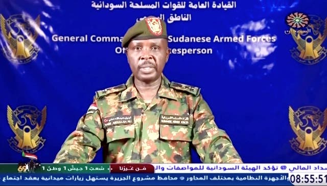 <p>A Sudanese army spokesperson gives a statement after the military retook the Republican Palace in Khartoum</p>