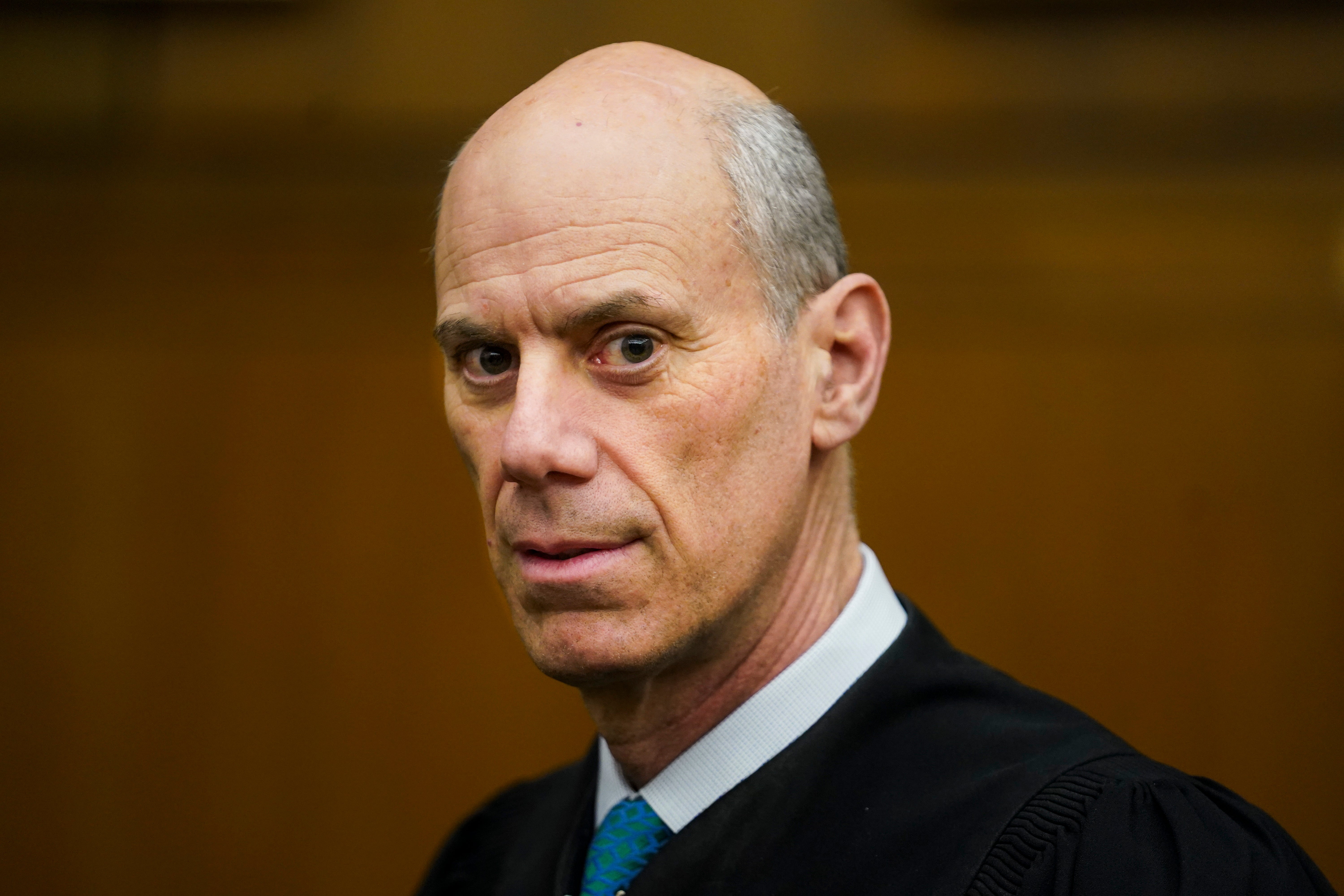 U.S. District Judge James Boasberg has temporarily blocked the Trump administration from deporting immigrants under the Alien Enemies Act