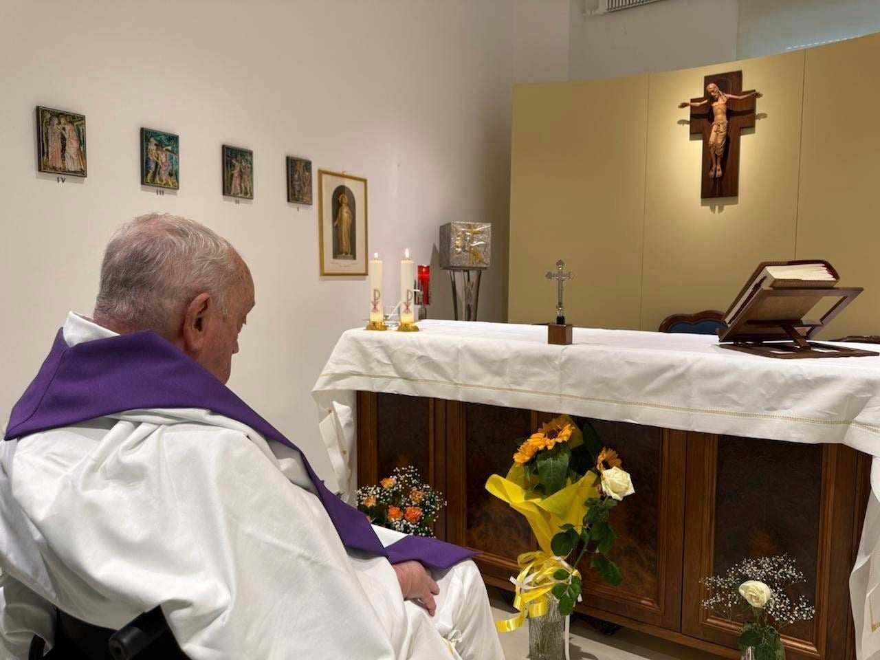 This picture released by the Vatican Press Office shows Pope Francis concelebrating a mass inside his private chapel at the Agostino Gemelli Polyclinic in Rome