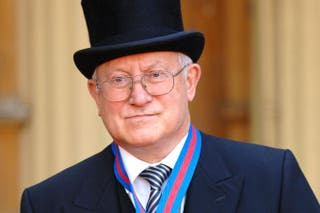 Oleg Gordievsky at Buckingham Palace after receiving the Companion of the Most Distinguished Order of St Michael and Saint George from the Queen