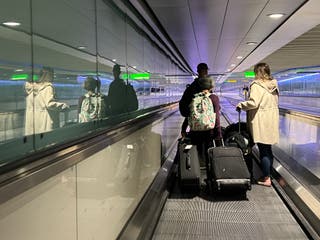 Stranded passengers at Heathrow Terminal 3 in London. British Airways say they have been given clearance for eight long-haul flights to depart from 7pm on Friday