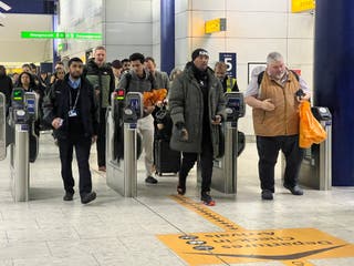 Passengers at Heathrow Terminal 5 station in London on Friday 21 March 2025