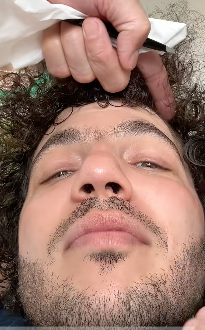 Benny Blanco posts a video of him getting his unibrow shaved for the first time on TikTok