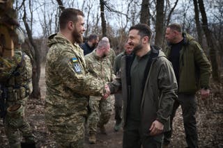 Ukraine's president Volodymyr Zelensky (C) meeting soldiers during a meeting with officers of the Ukrainian Armed Forces at an undisclosed location in the Donetsk region