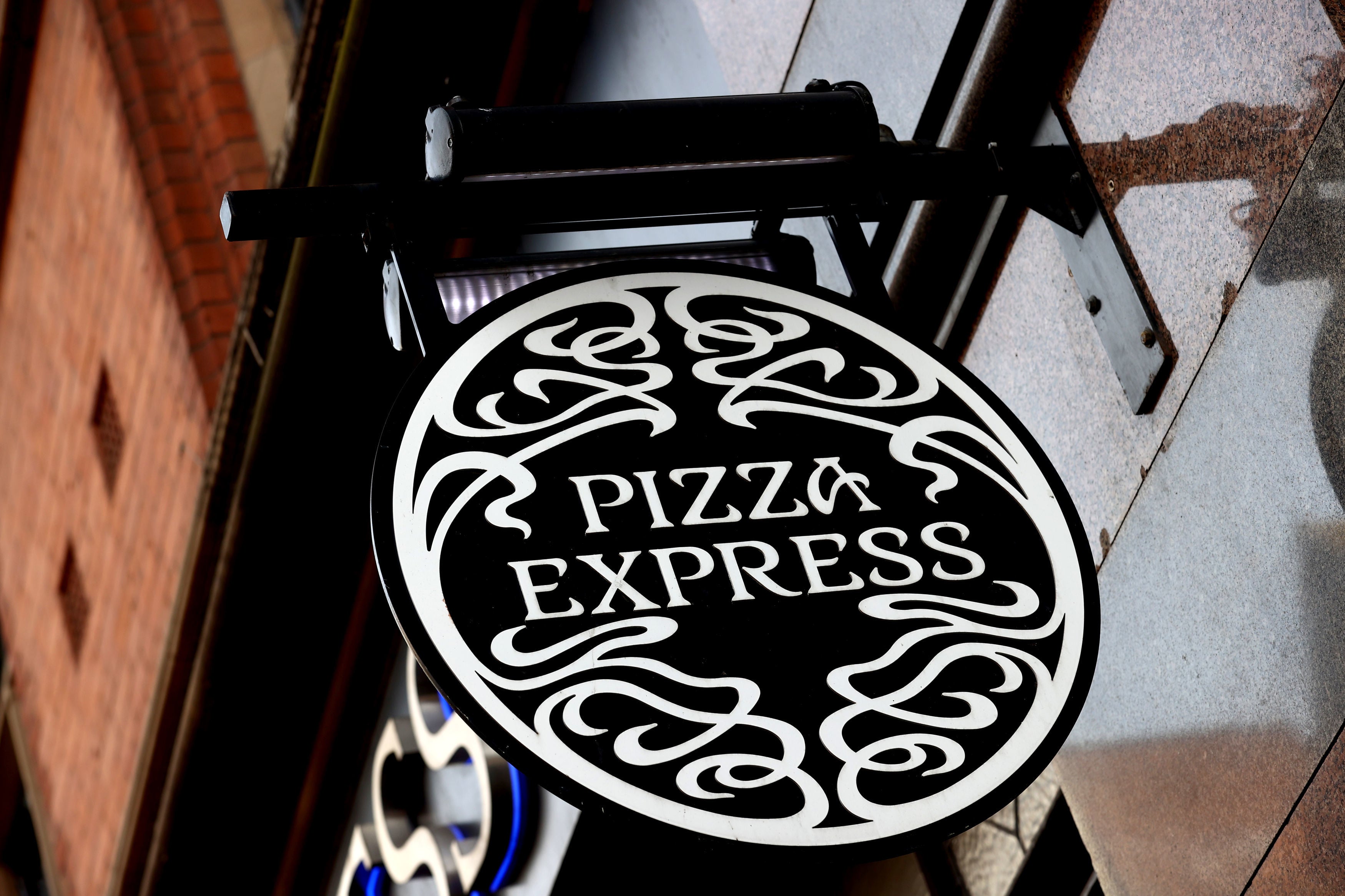 Pizza Express waiter wins &pound;5k race harassment case after colleague called him a &lsquo;Yank&rsquo;