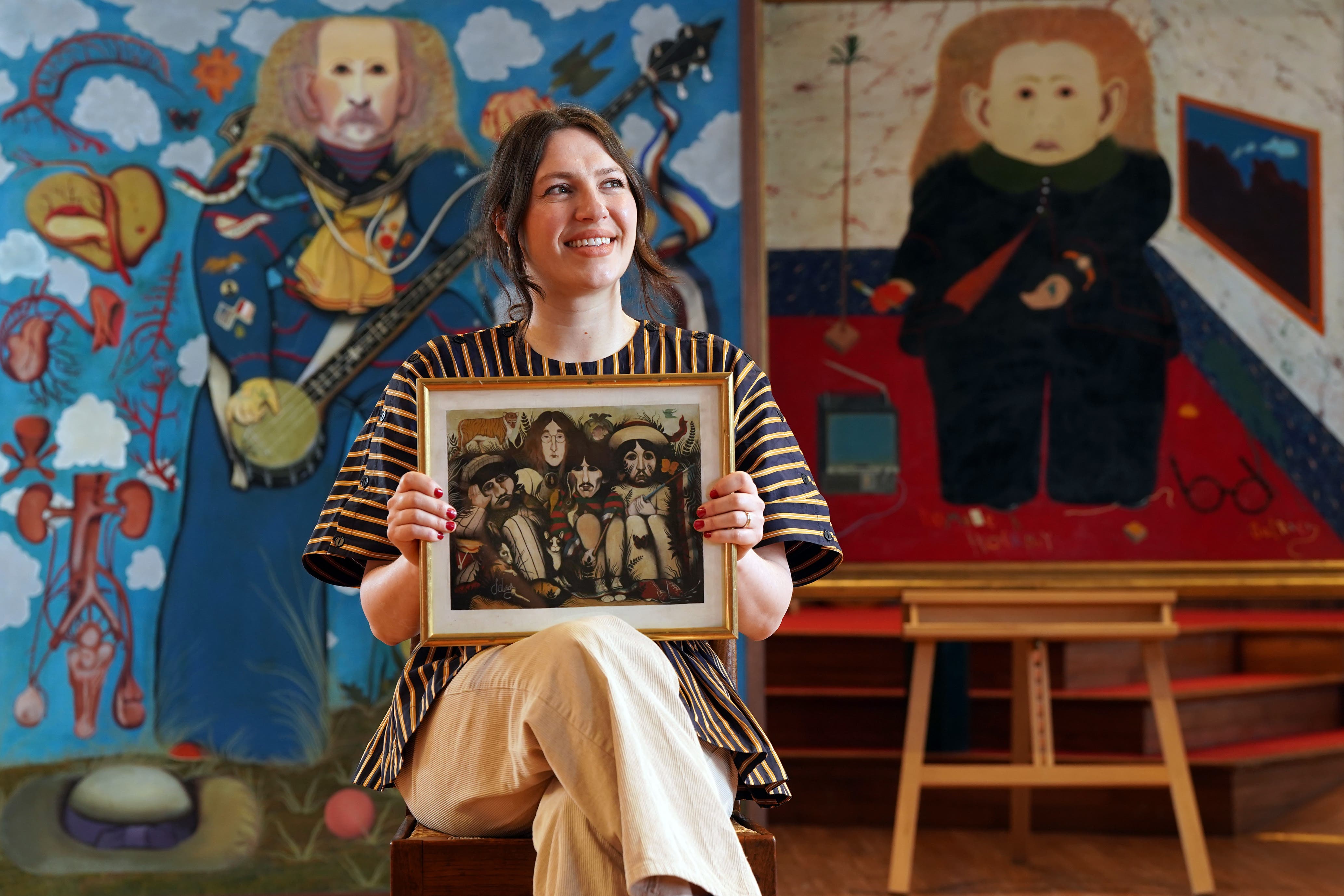 A painting of The Beatles is among the artworks being sold (Stewart Attwood/PA)