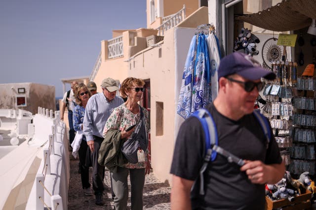 <p>Passengers of cruise ship "Celestyal Discovery" visit the village of Oia, Santorini</p>