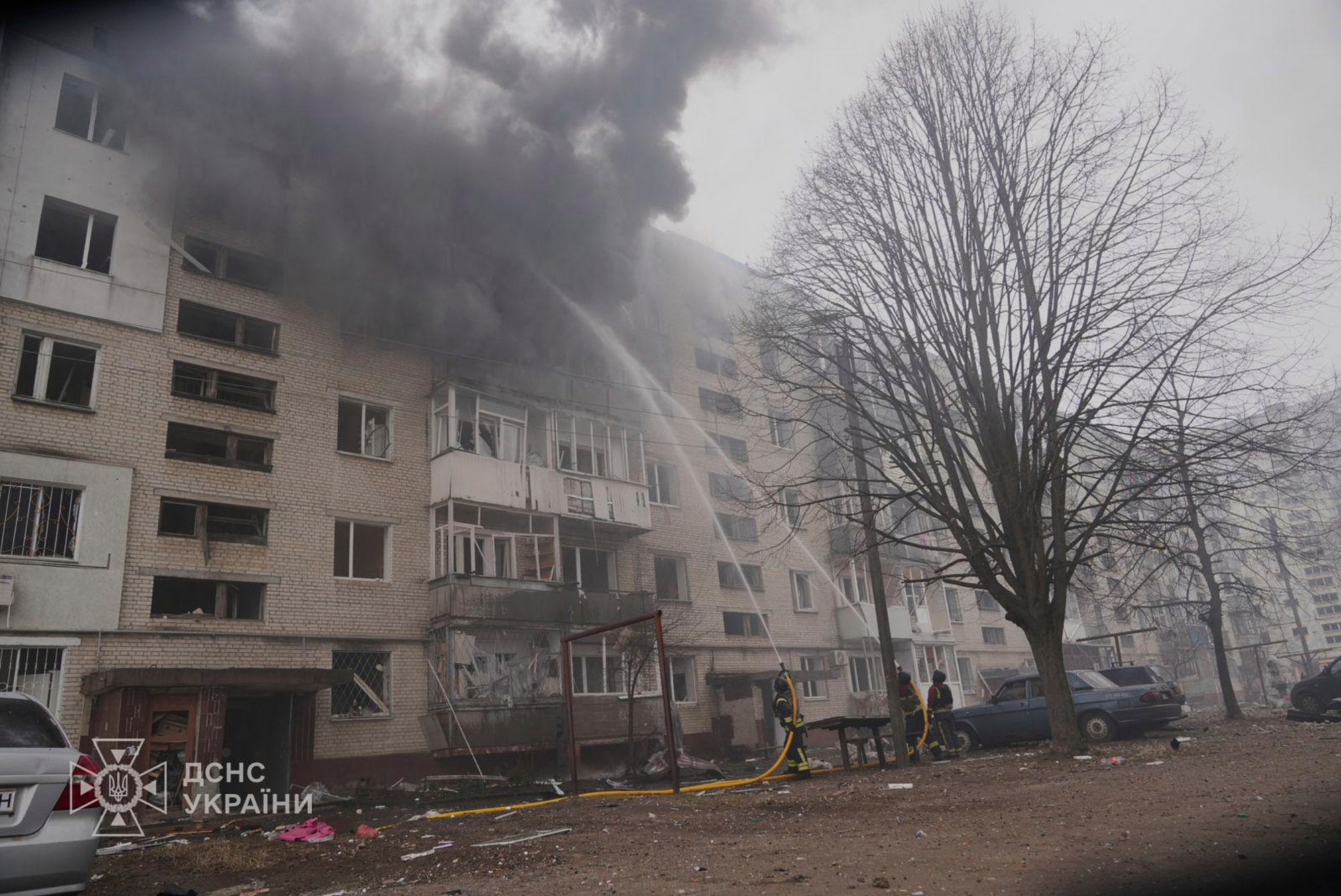 Firefighters put out the fire following a Russian attack in Sumy, Ukraine, Tuesday, March 25