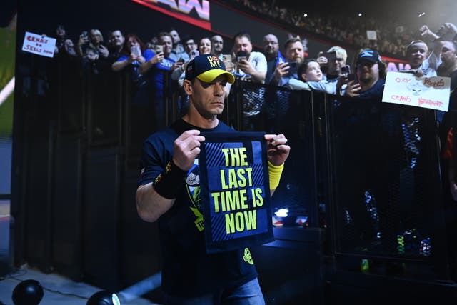 <p>John Cena walks to the ring in Glasgow during WWE Raw</p>