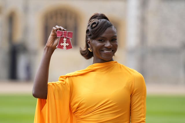 Dina Asher-Smith after being made a Member of the Order of the British Empire by the King at an investiture ceremony at Windsor Castle, Berkshire (Andrew Matthews/PA)