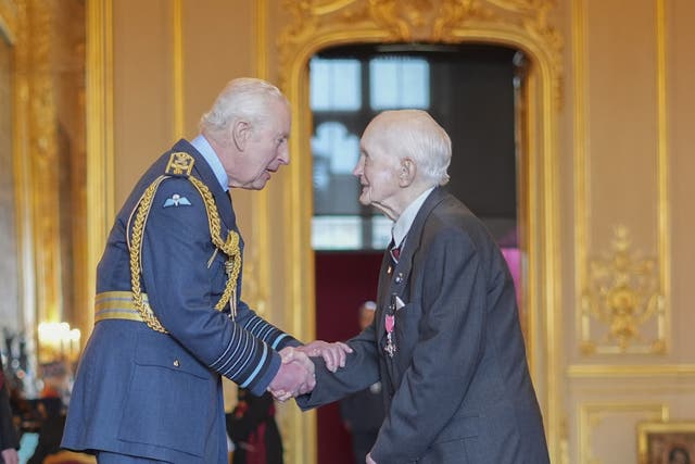 George Kelly is made a Member of the Order of the British Empire by the King at Windsor Castle (Jordan Pettitt/PA)