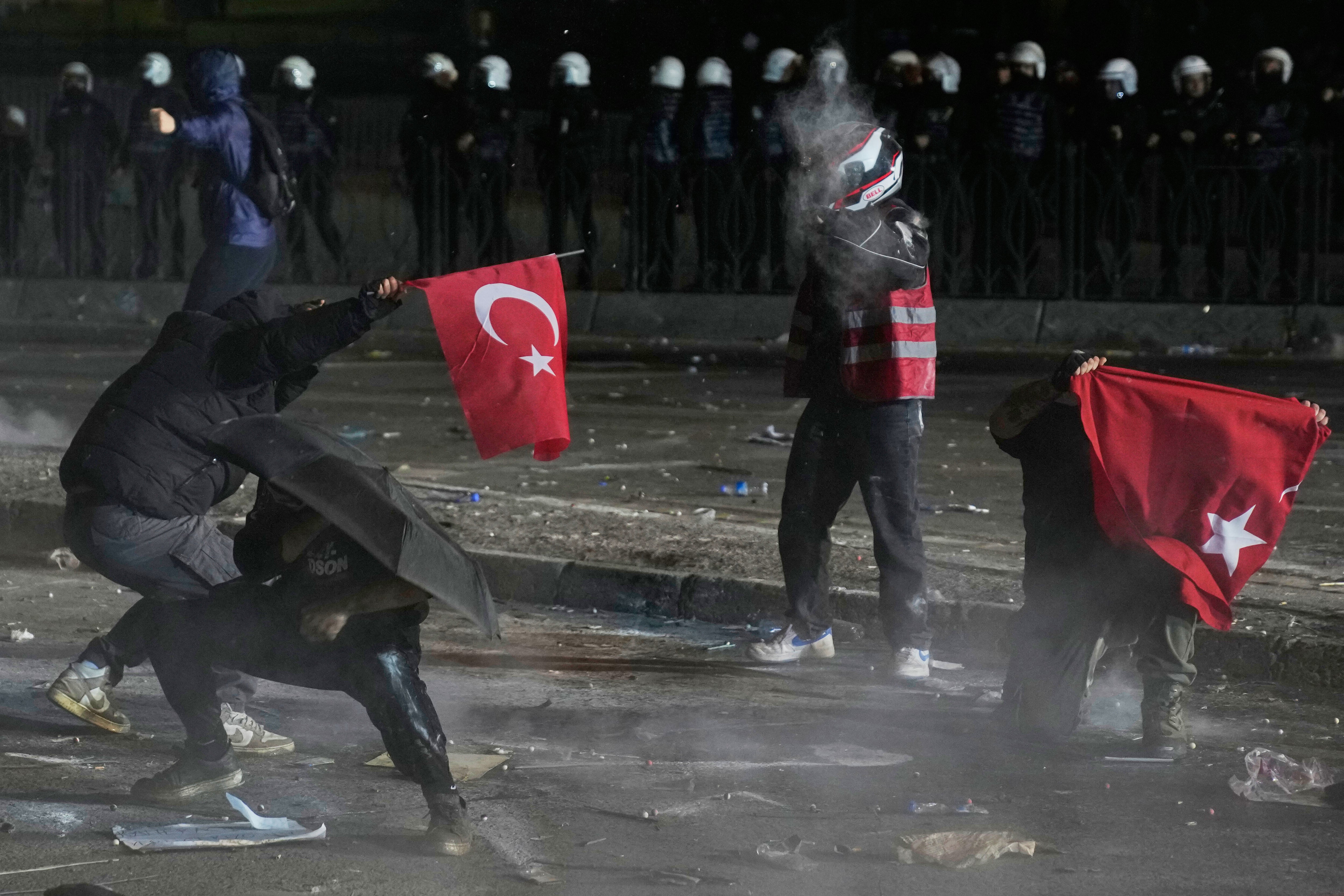 Riot police fire tear gas pellets to disperse protesters in Istanbul