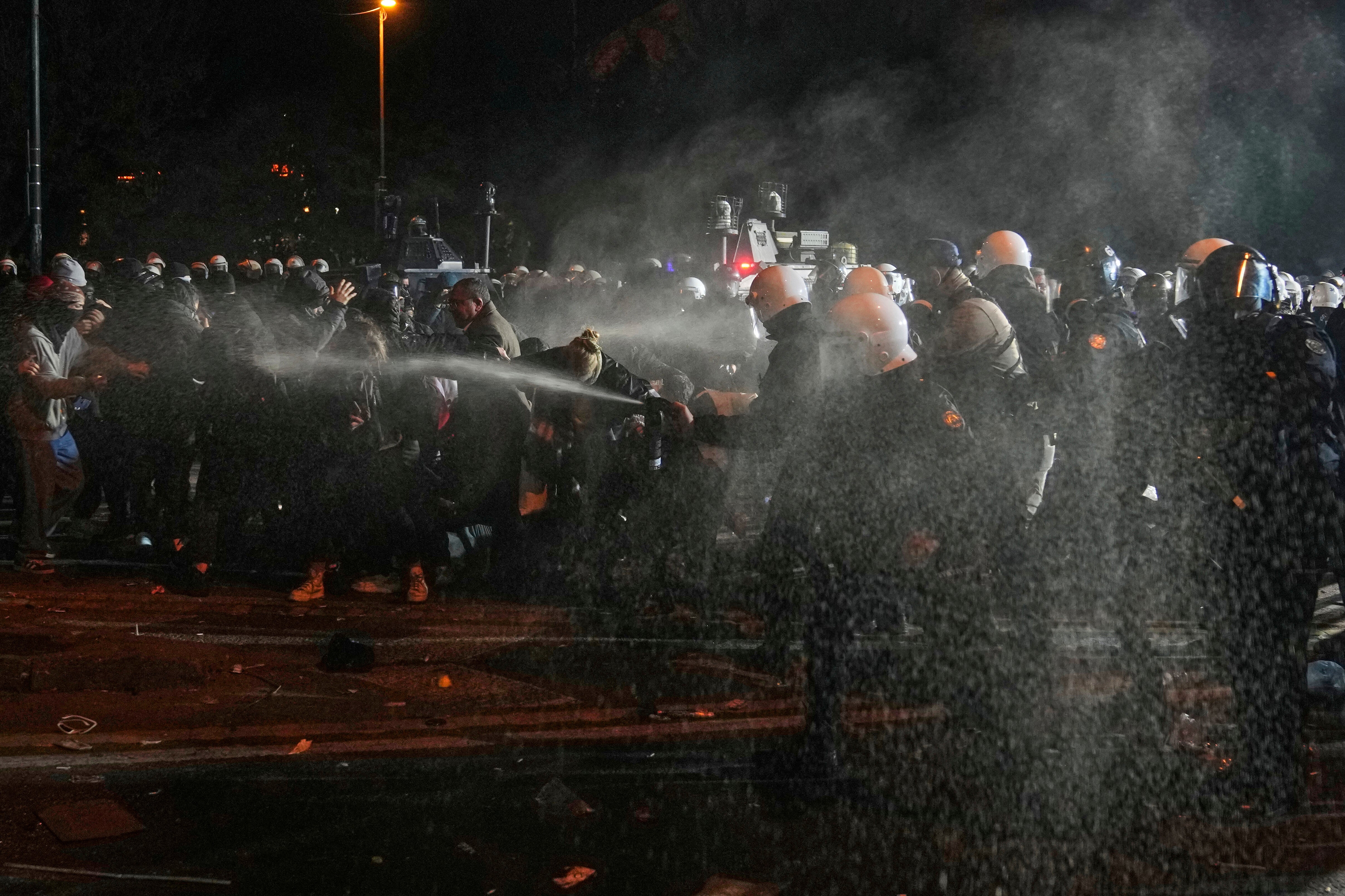 Anti-riot police officers use pepper spray in Istanbul, Turkey