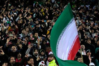 Iranian fans celebrate after qualifying for the World Cup